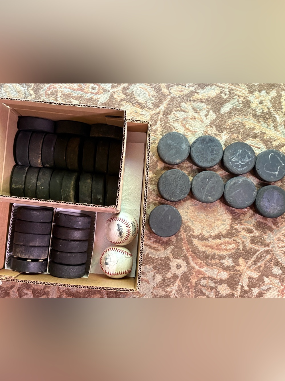 Hockey pucks and baseballs